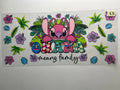 Sticker with cartoon character and text 'family means family' on a white background